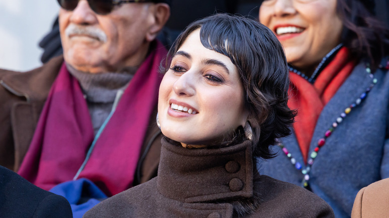 Rama Duwaji smiles wearing silver earrings
