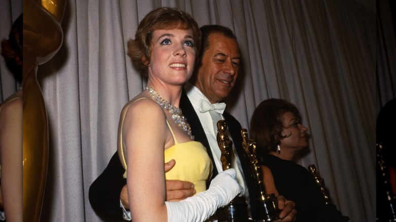 Julie Andrews holds her award after presentations at the 37th Annual Academy Awards