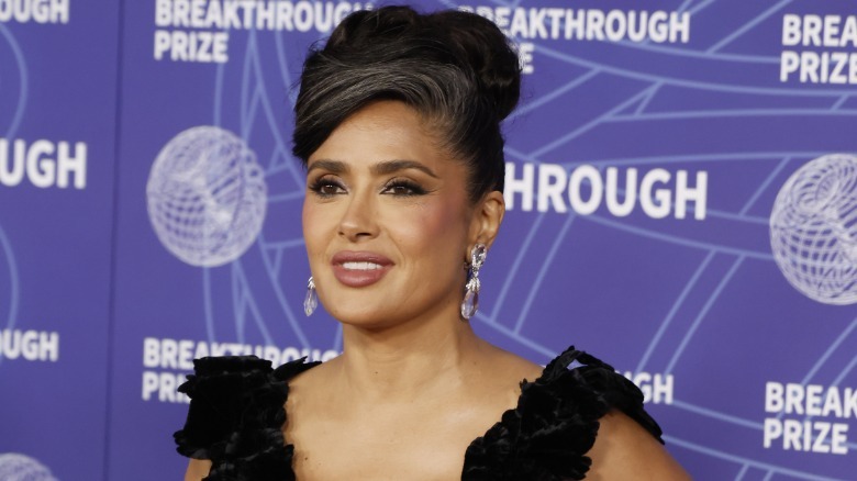 Salma Hayek smiles on the red carpet in 2026