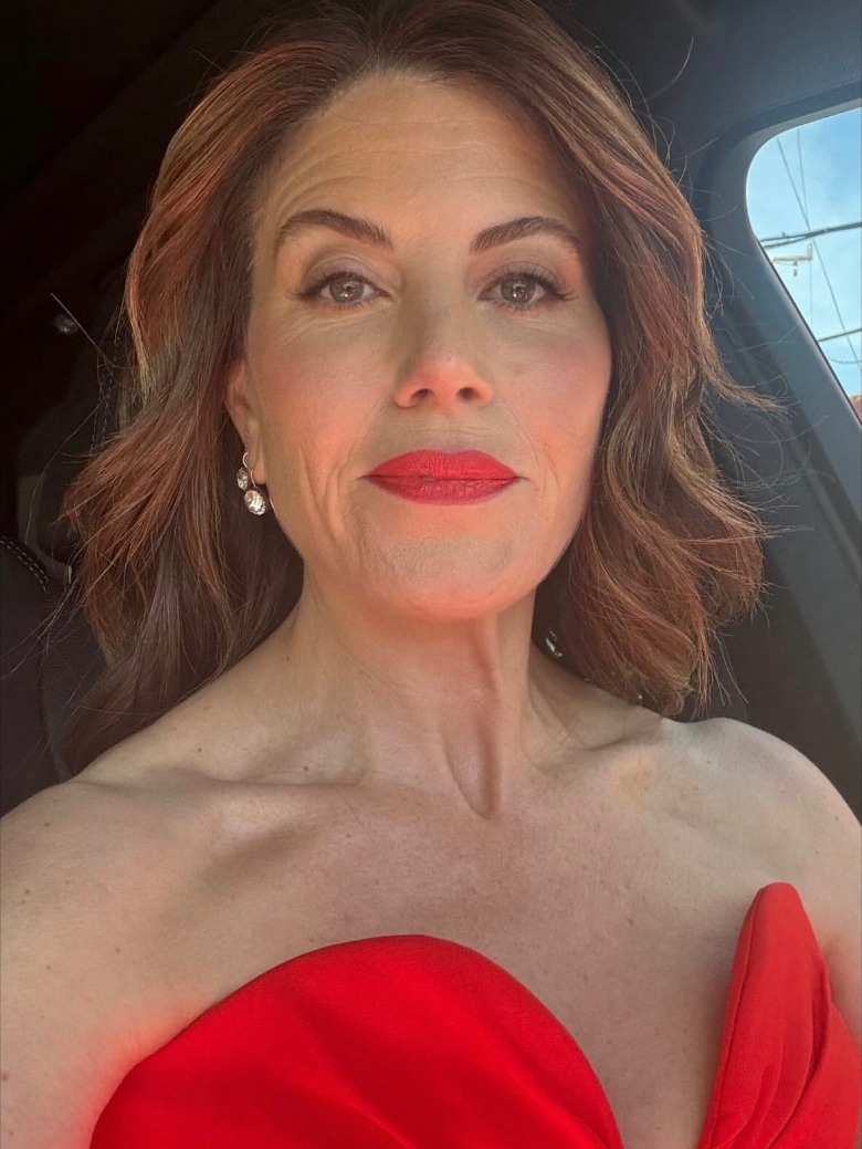 Close-up car selfie of Monica Lewinsky with a red carpet-ready beauty look