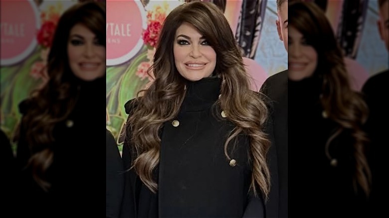 Kimberly Guilfoyle smiling with a side part
