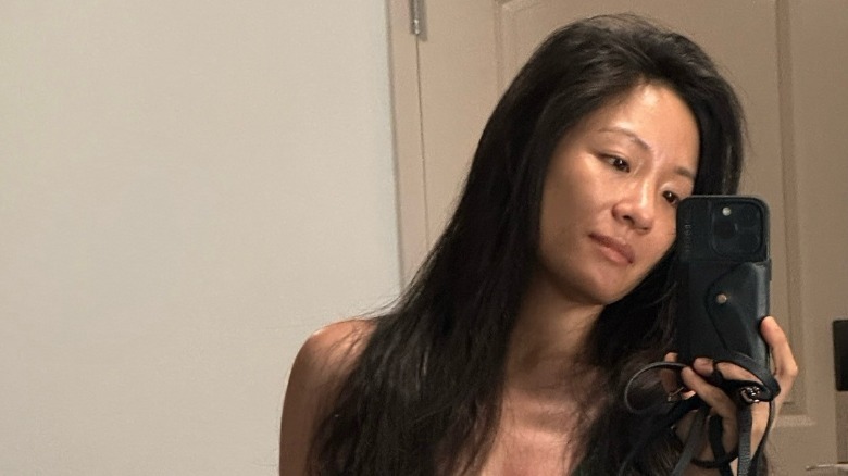 Constance Wu takes a mirror selfie after a workout