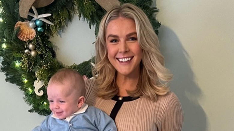 Karline Leavitt smiling with her son