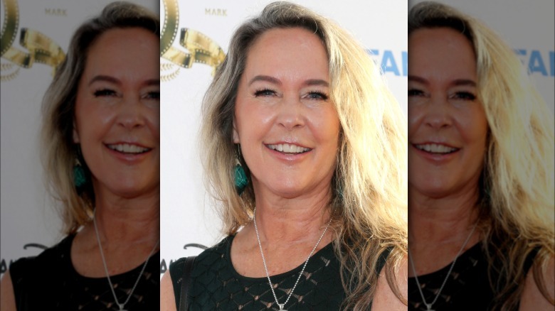 Erin Murphy smiles on the red carpet in 2026