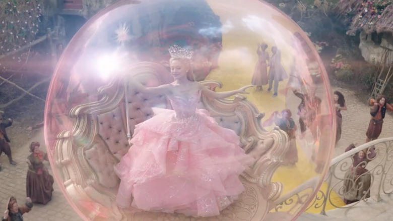 Glinda in her pink bubble in the