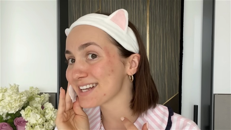 A screenshot of Maude Apatow on the Vogue series Beauty Secrets on YouTube