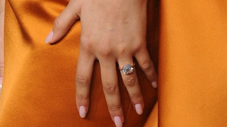 Zendaya's hand showcasing her engagement ring in January 2025