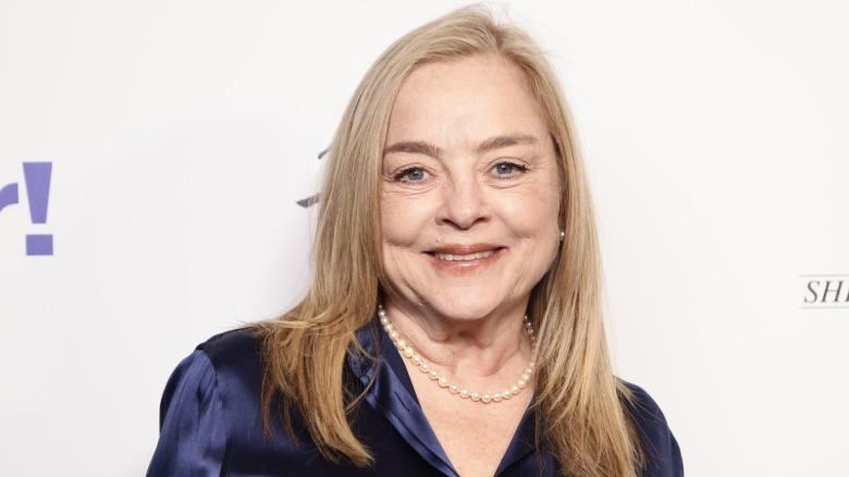 Robin Mattson smiles on the red carpet in 2023